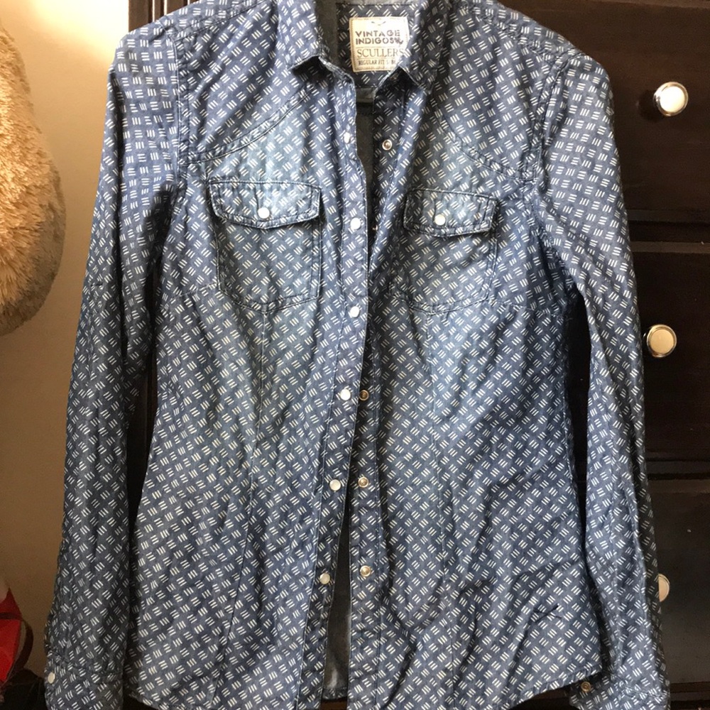 Denim shirt.